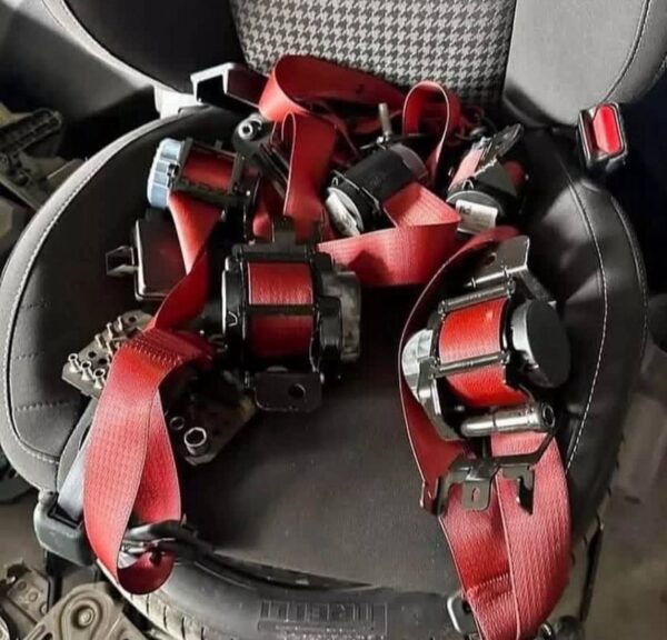 Dodge Challenger red seatbelts, performance seatbelts, custom car seatbelts, Precision Parts Hub, Challenger interior upgrades, automotive safety accessories